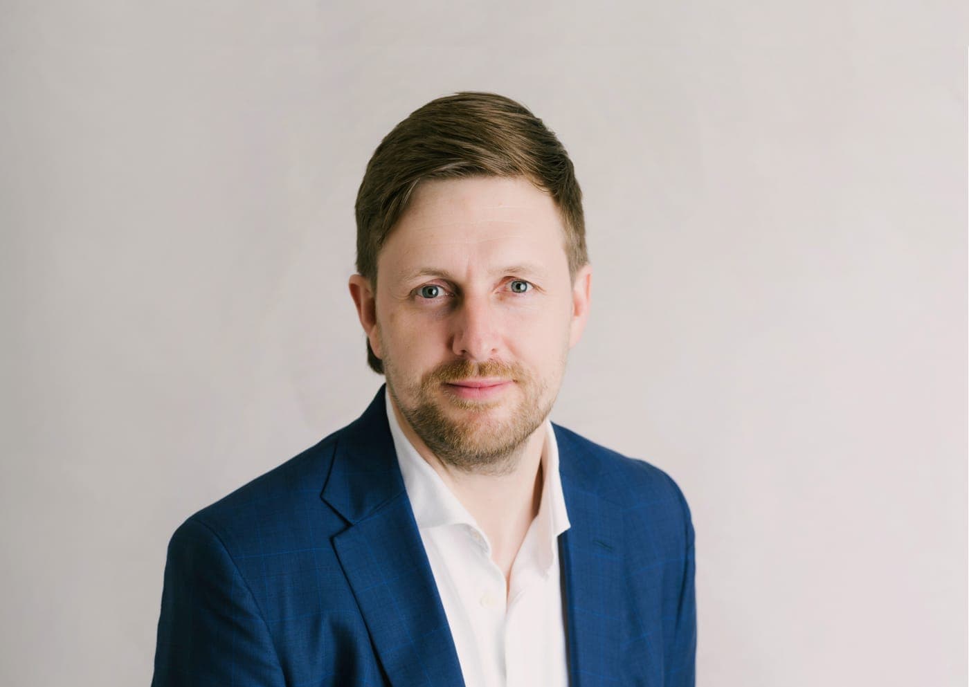 Portrait of Luke Kelly, Managing Director at Recoversure